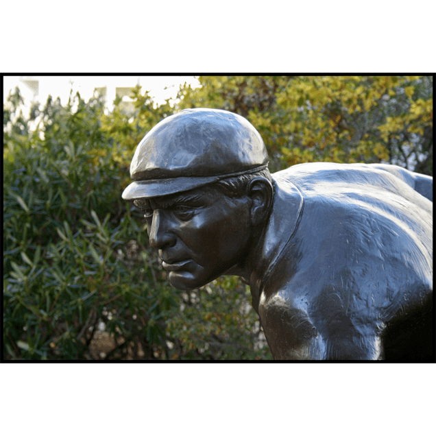 closeup photo of bronze sculpture of Cy Young