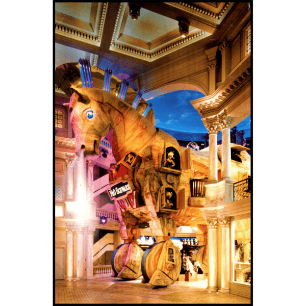 photo of large Trojan Horse sculpture with toys in windows and doors, serving as a store, inside Caesars Palace