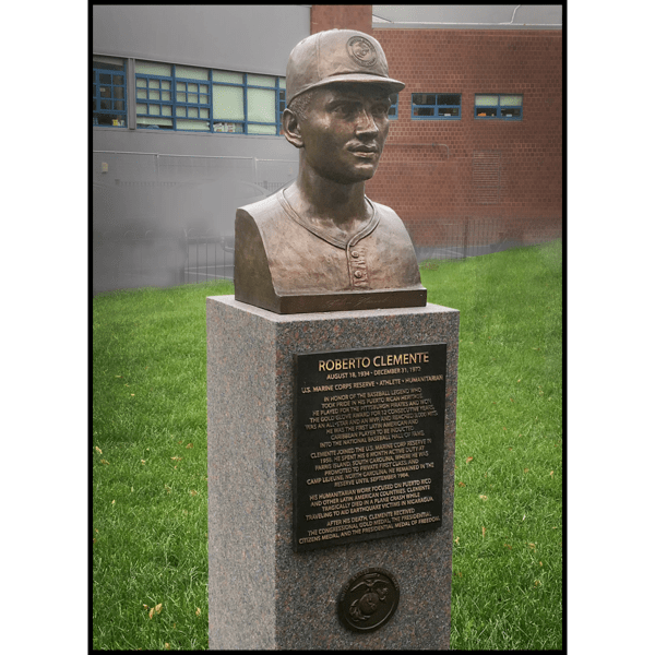 photo of bronze portrait bust sculpture of Roberto Clemente on granite base with bronze plaque