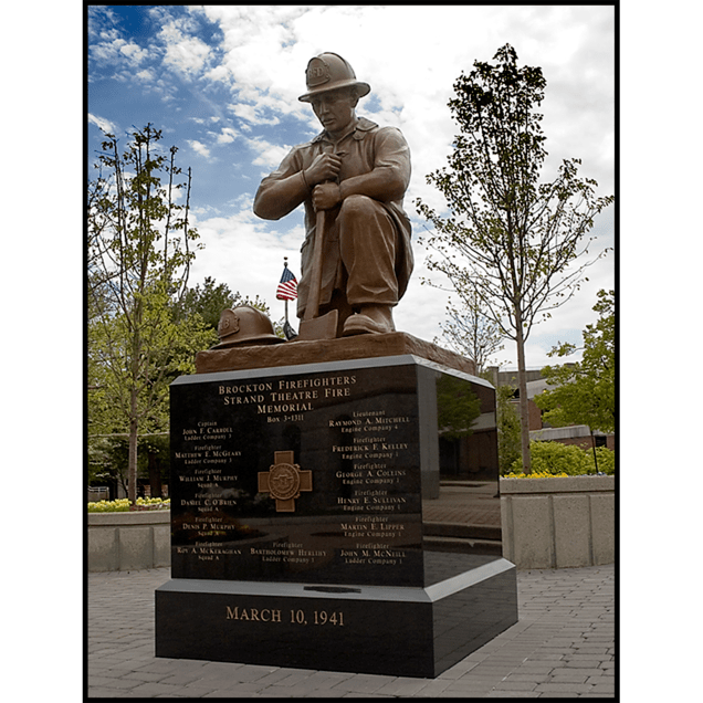 exterior photo of bronze sculpture of firefighter