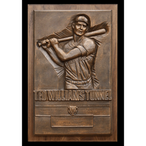 photo of bronze relief of Ted Williams batting on wood mount