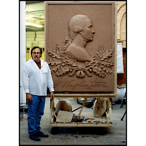 photo of clay model of sculpture relief portrait of George Washington in profile with oak leaves and his signature with sculptor Robert Shure