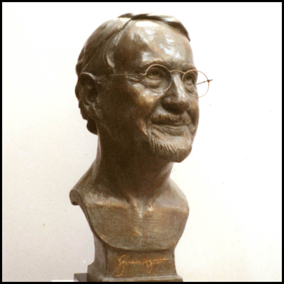 photo of bronze-colored sculpture bust of Gordon Hyatt against white background
