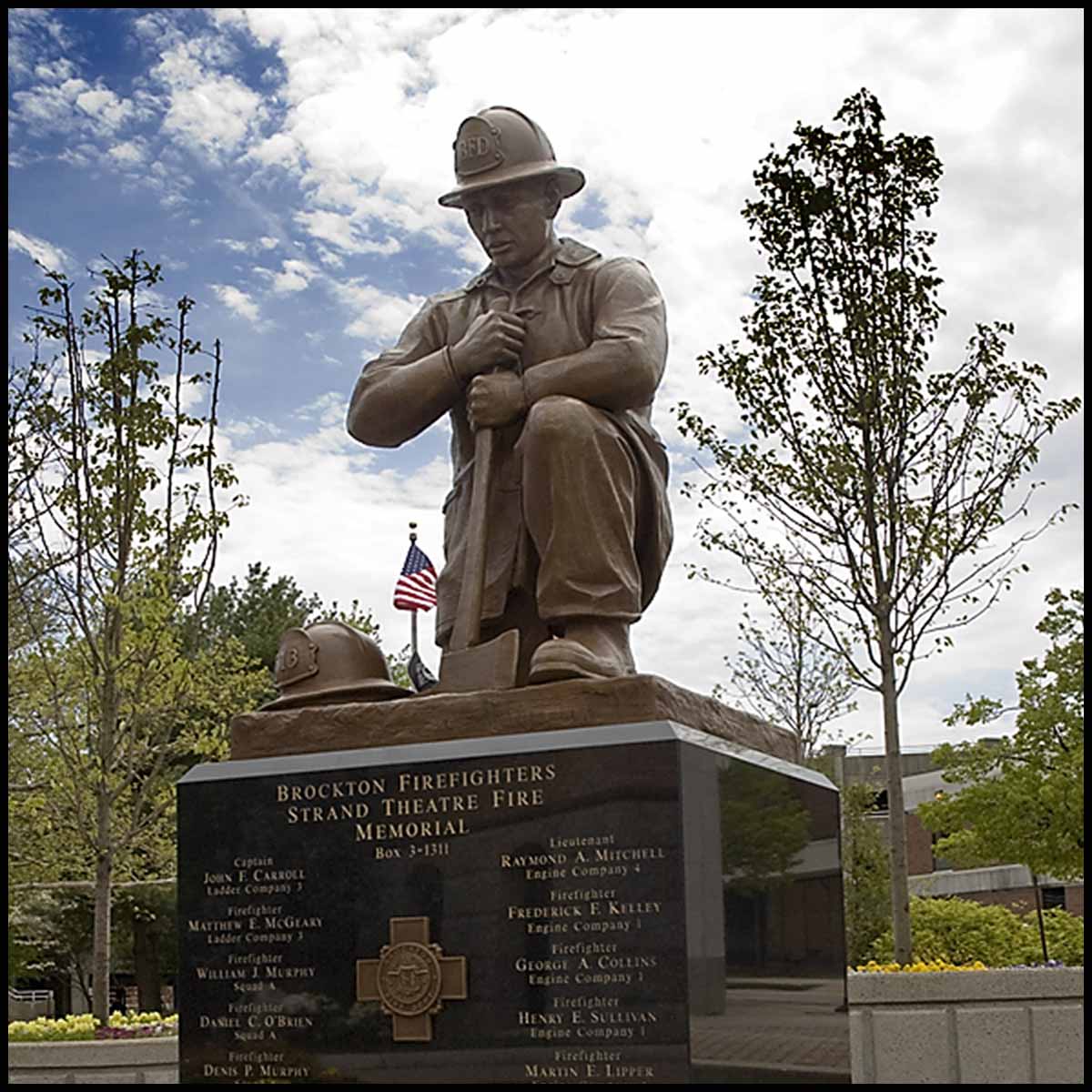 exterior photo of bronze sculpture of firefighter